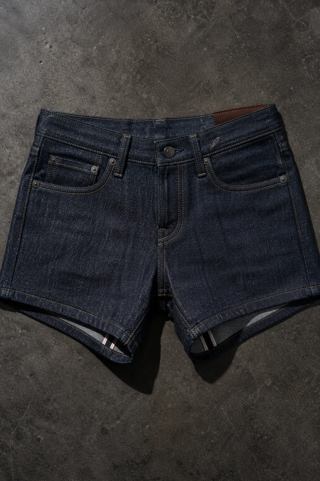 Footing, Low-rise selvedge denim cutoff short, clean-finished hem